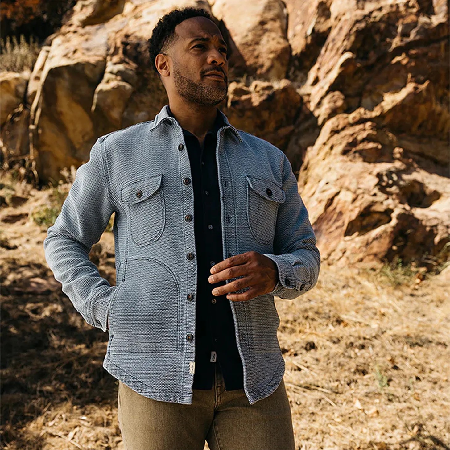 a man in a light blue jacket