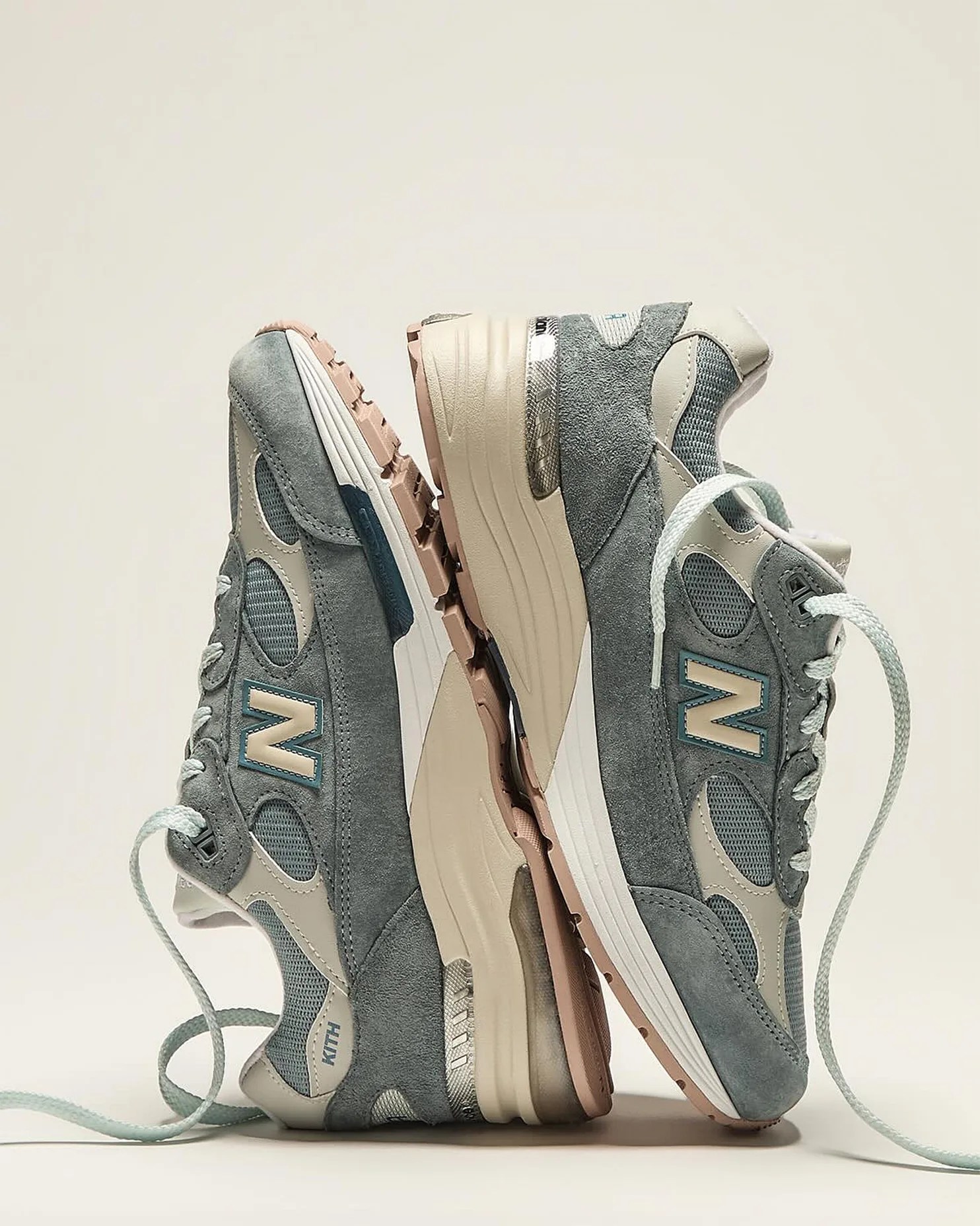 a pair of blue new balance sneakers