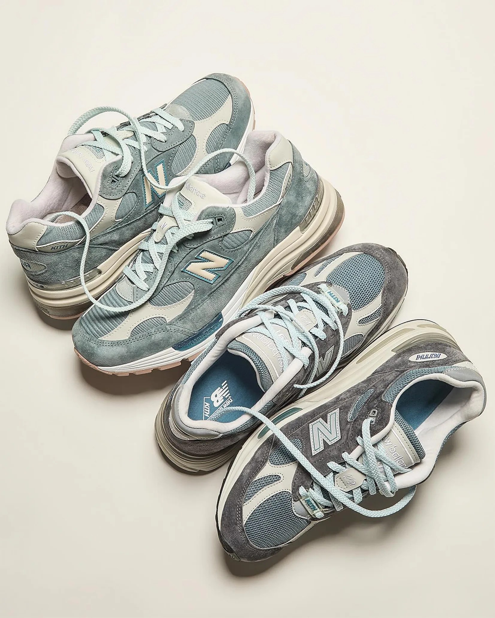 two pairs of blue running shoes