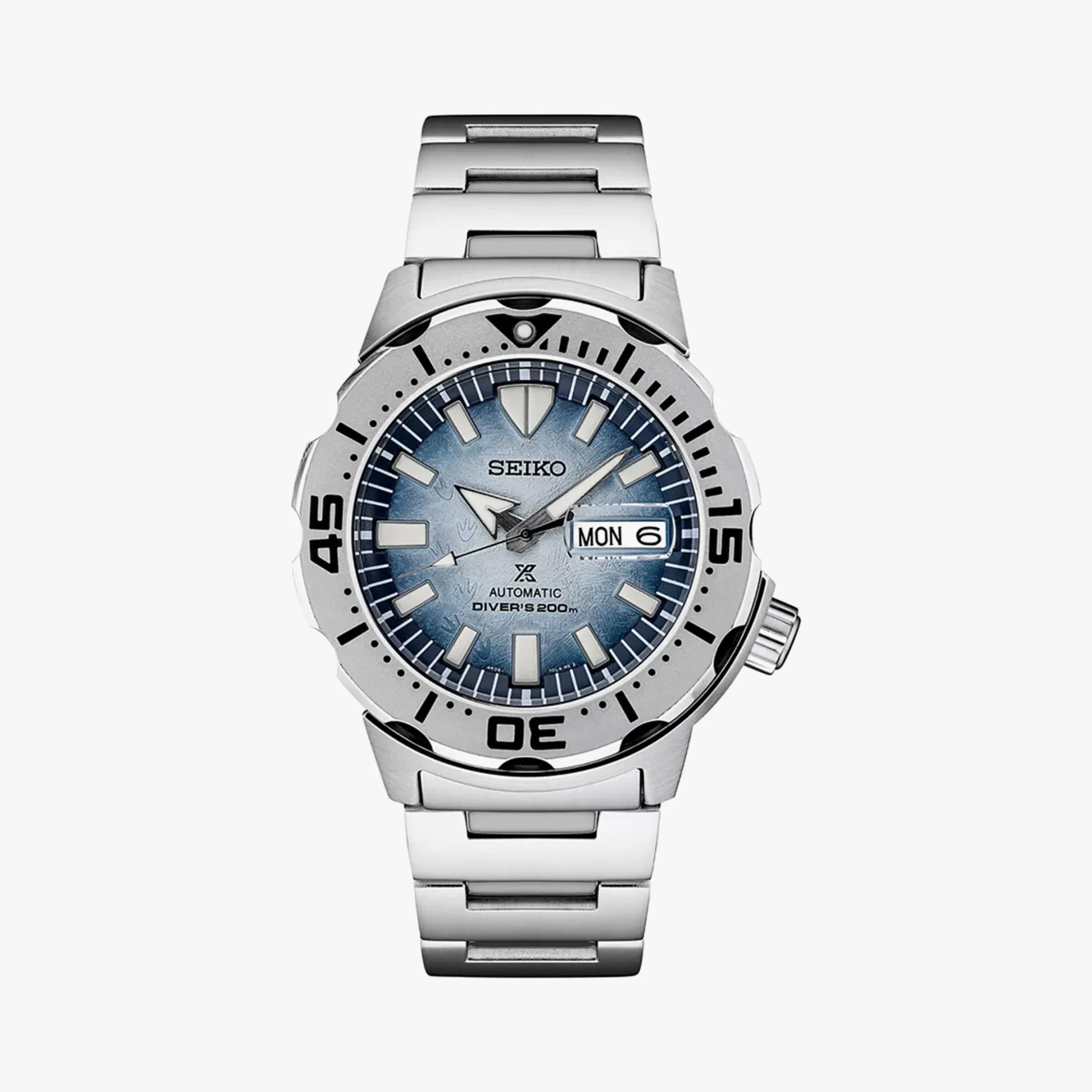 a steel dive watch with a steel bezel and white dial