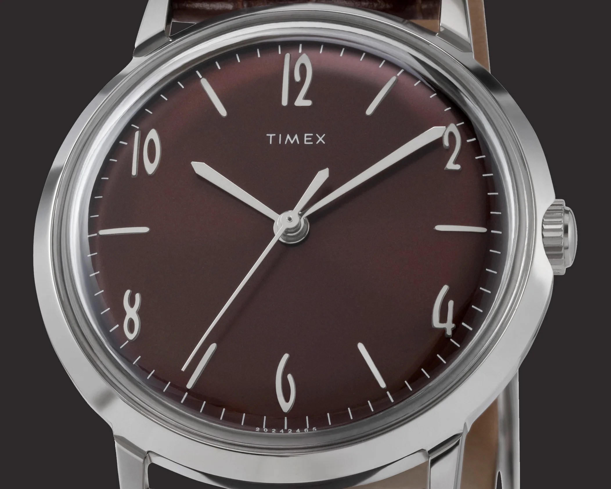 the burgundy dial of a Timex Marlin dress watch