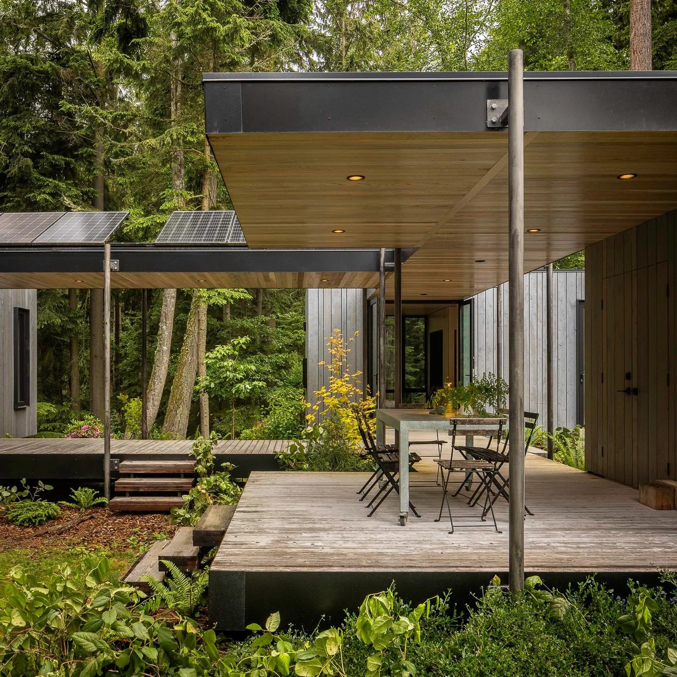 modern prefab house in the forests of the pacific northwest