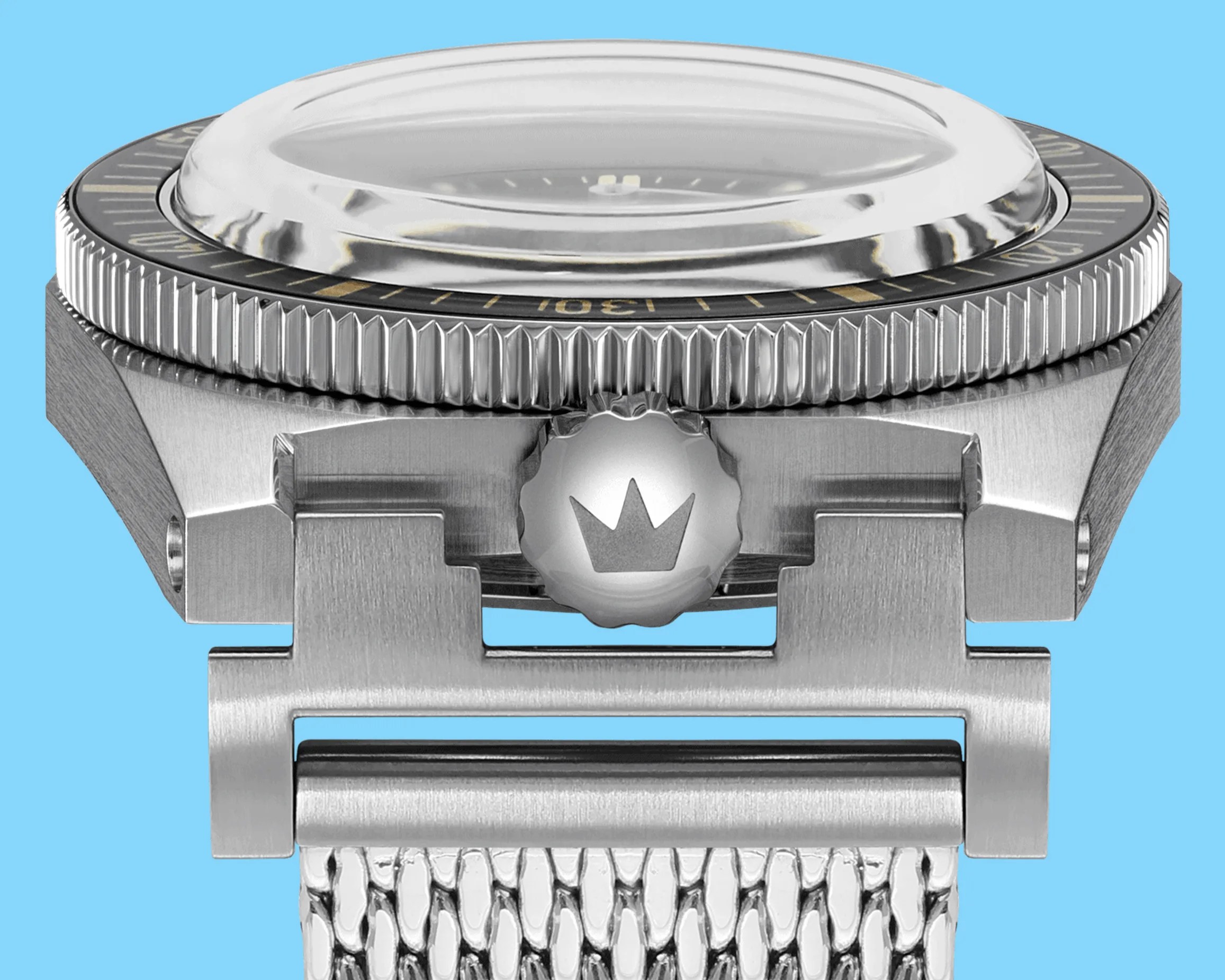 the crown of a steel ZRC dive watch