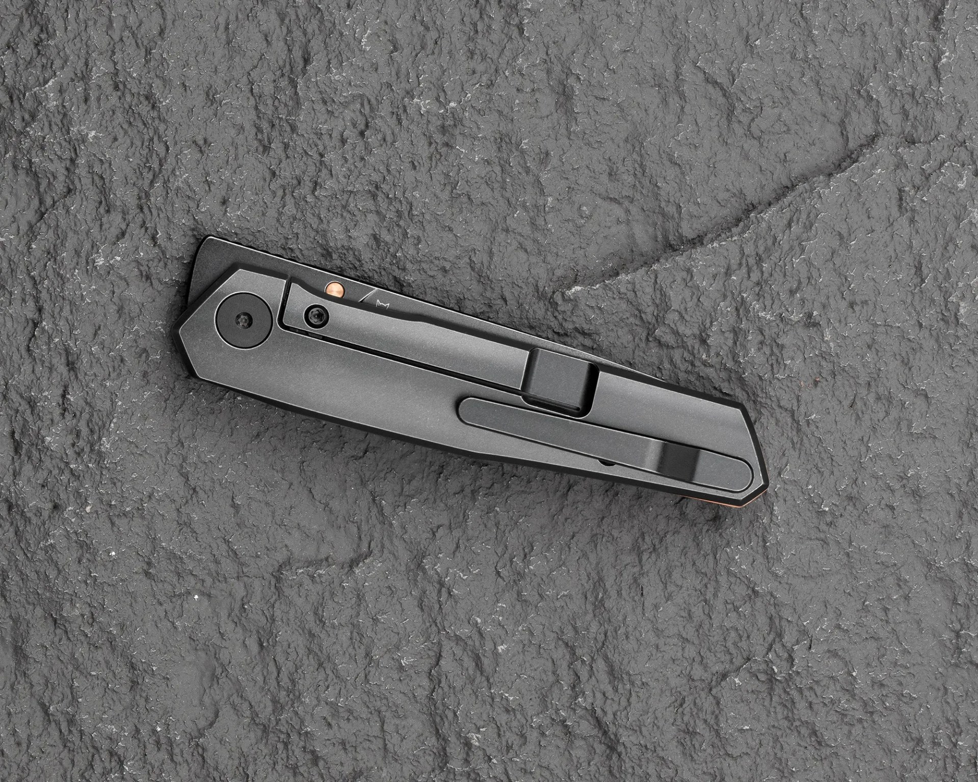 Bestech VK-Kuze knife closed on black stone background