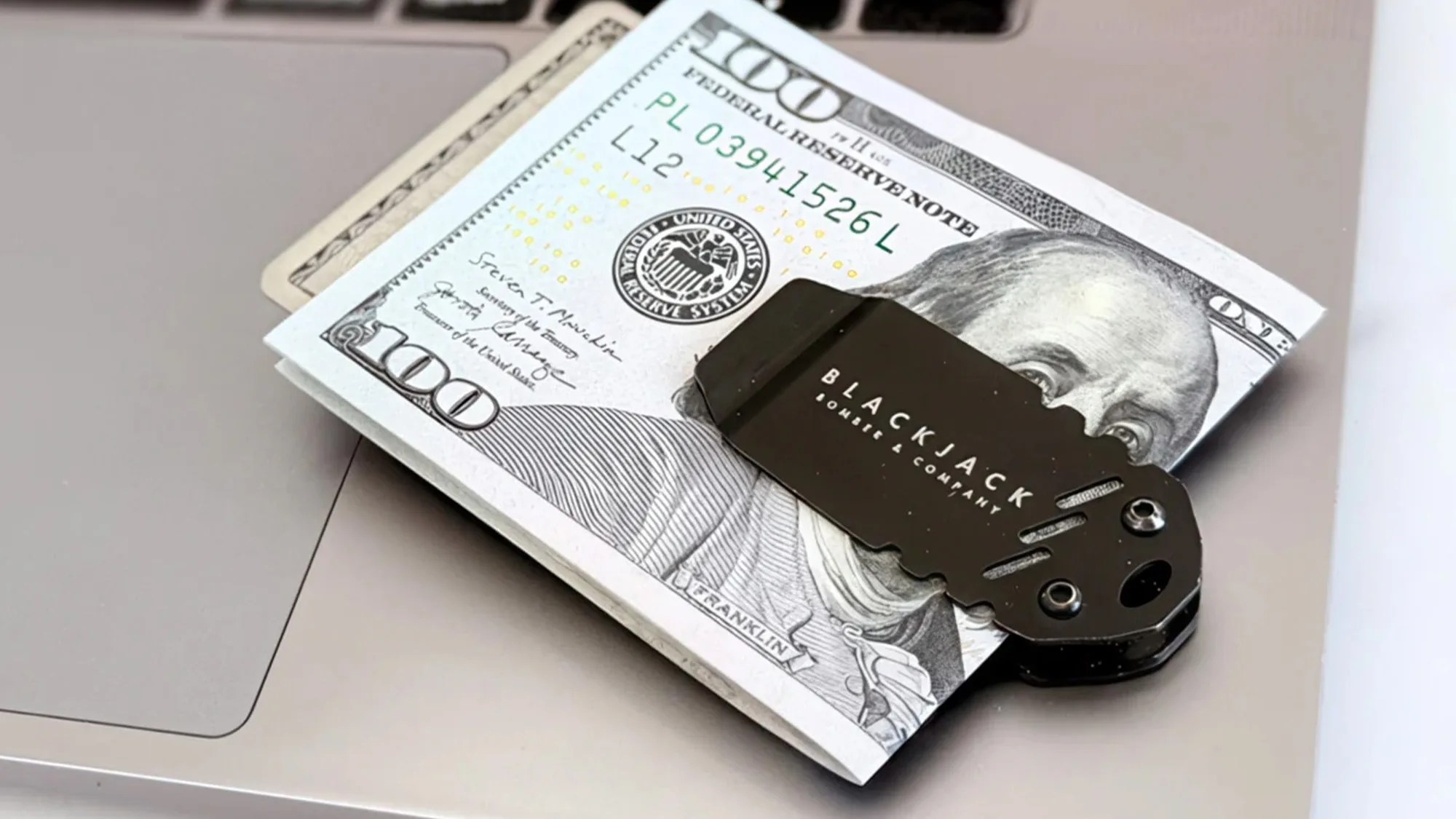 Bomber and Company Blackjack EDC Multi Tool Knife Money Clip on Macbook