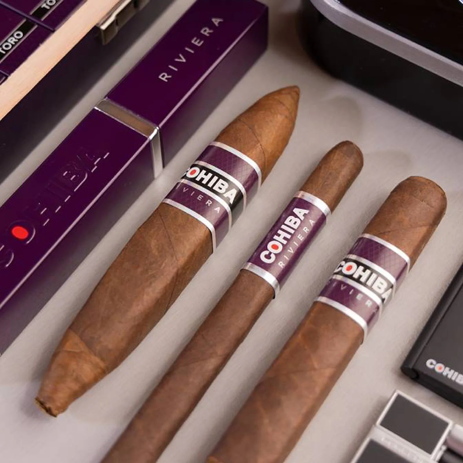 The Cohiba Riviera cigar collection shown laying flat on a table