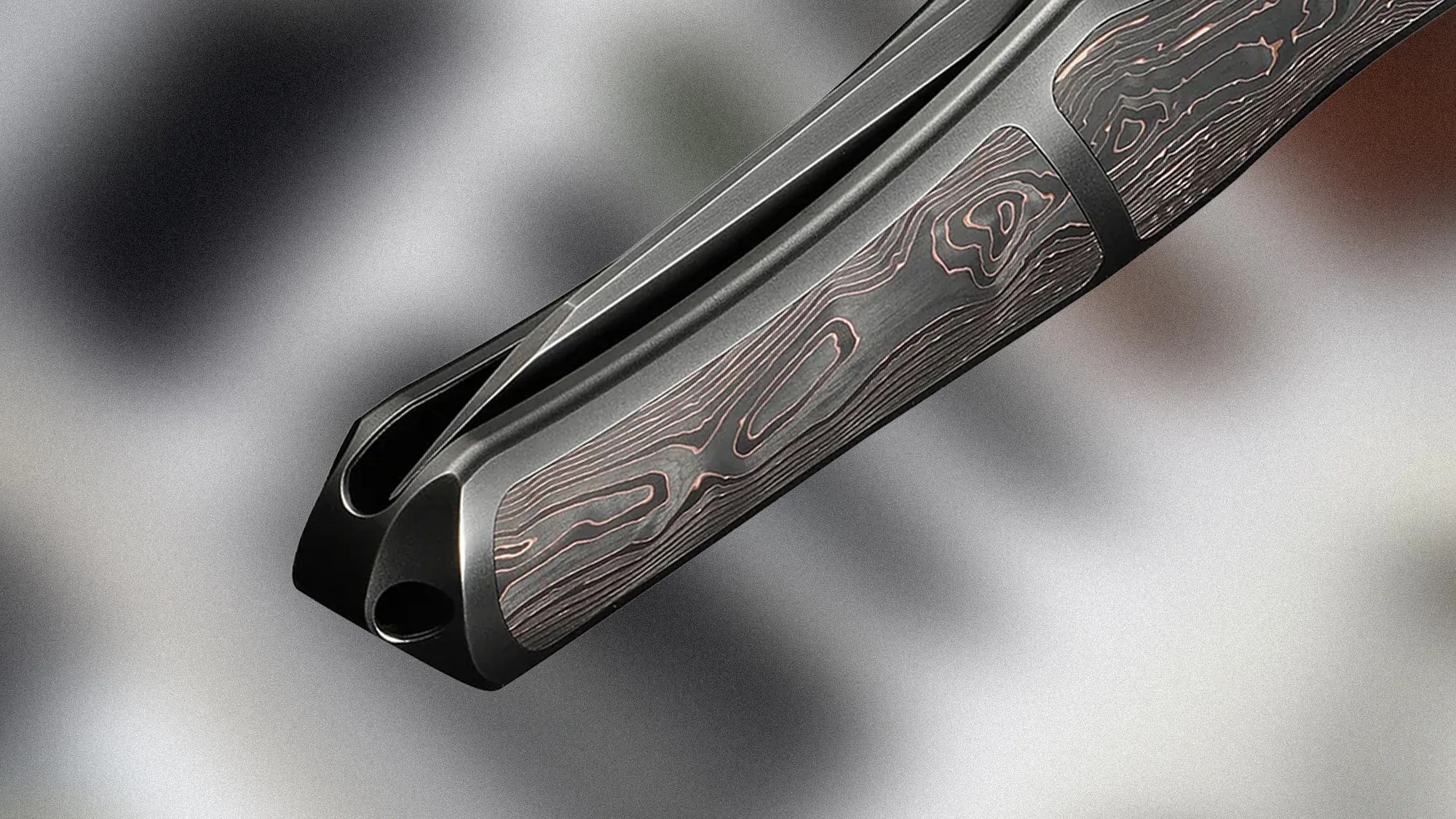 Closeup of We Knife 702xi handle