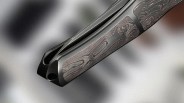 Closeup of We Knife 702xi handle