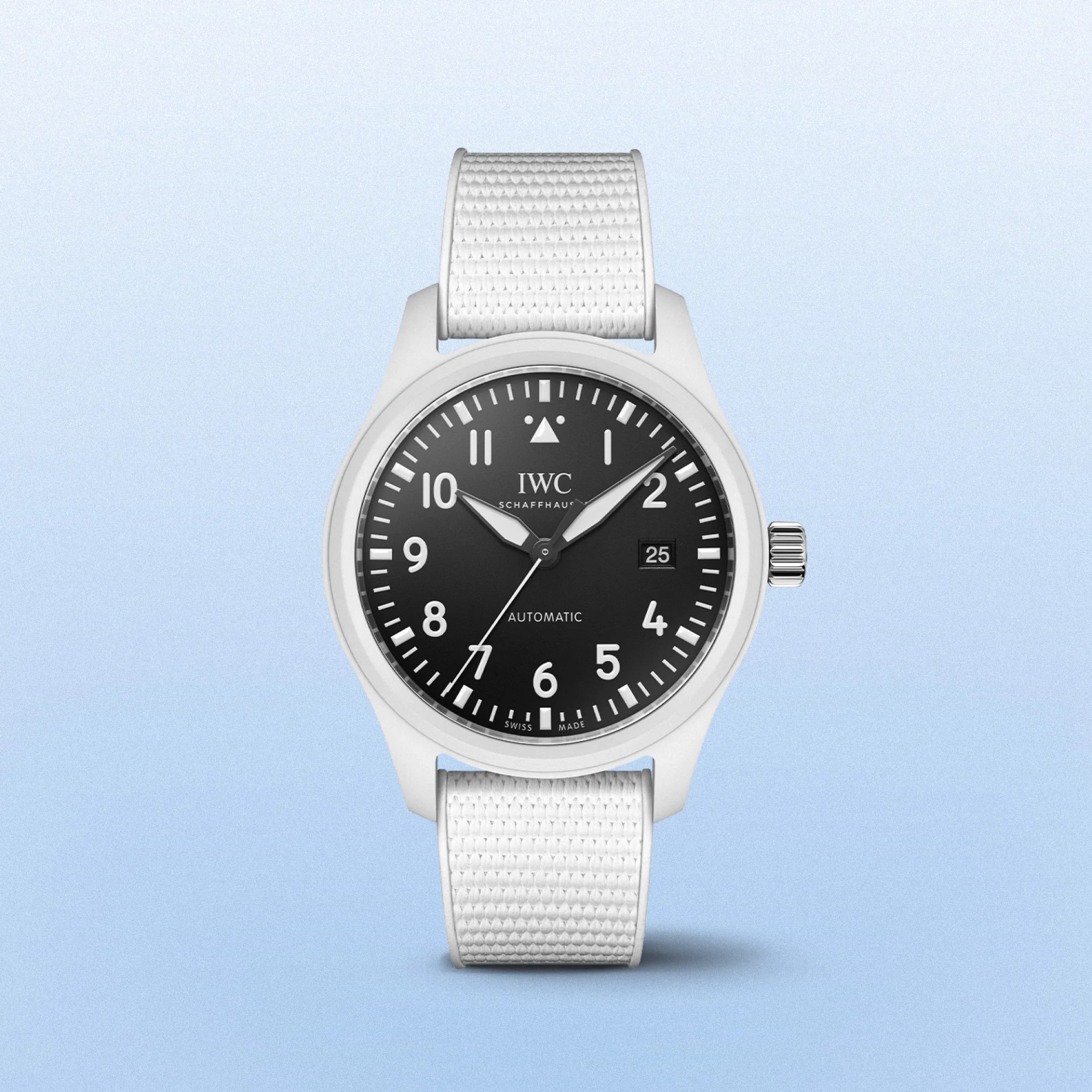 a white watch with a black dial