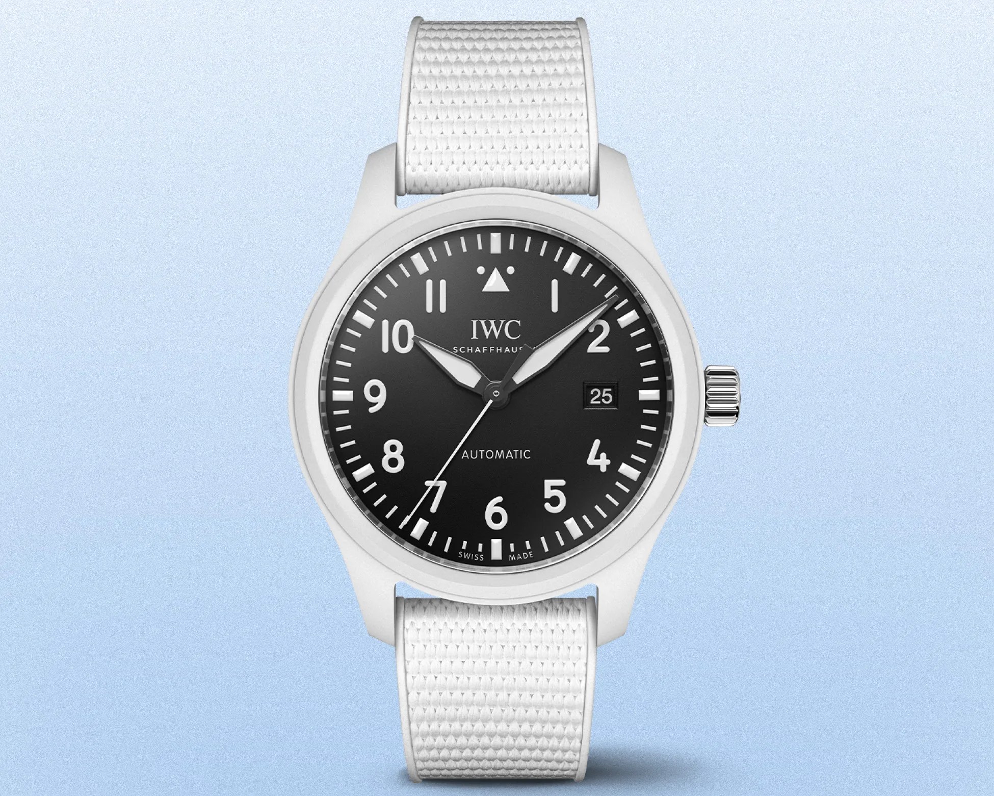 a white watch with a black dial