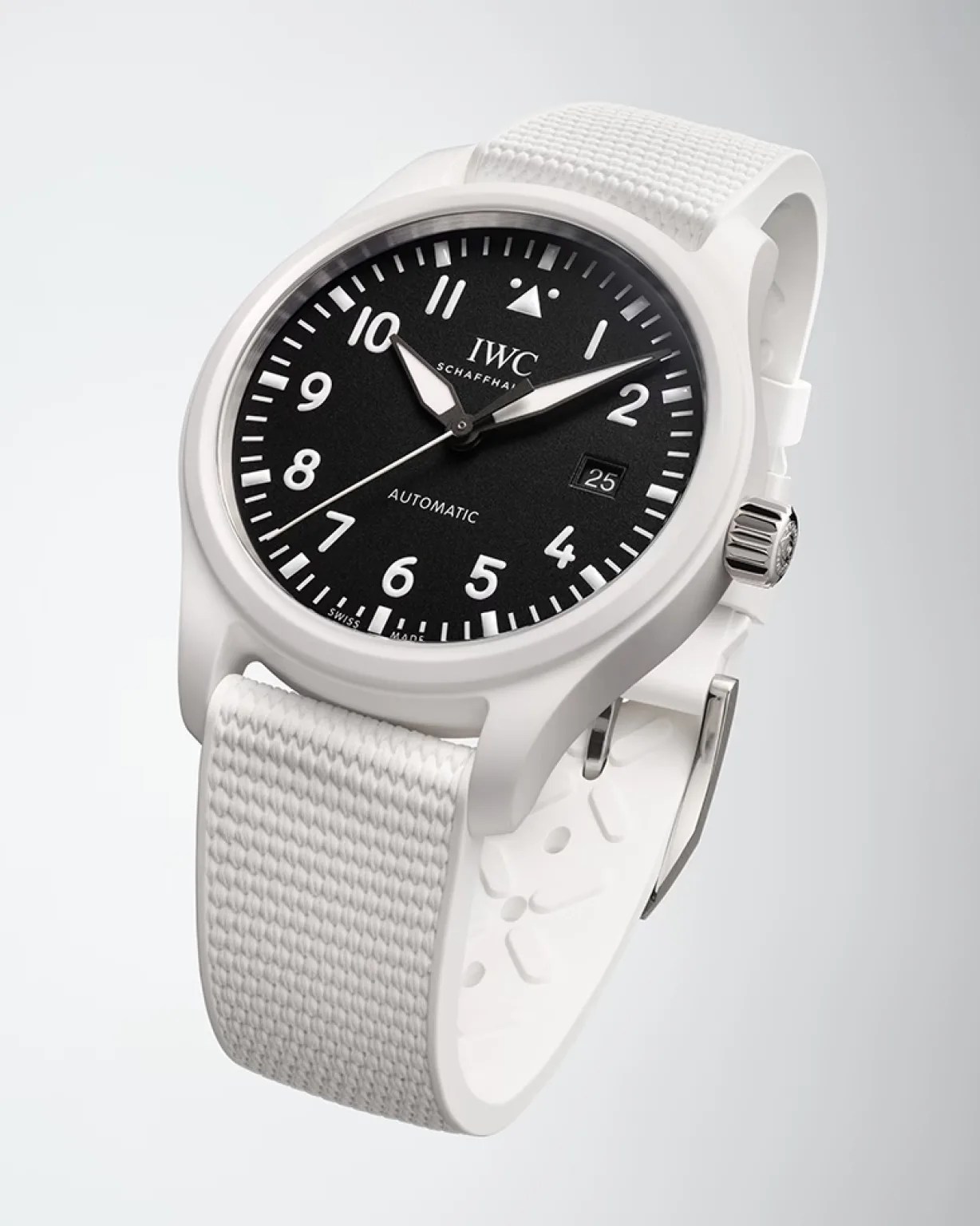 a white watch with a black dial