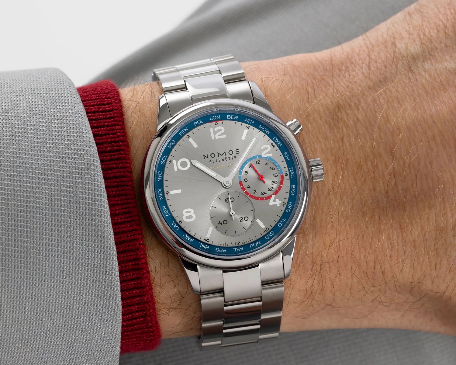 a nomos watch on a mans wrist