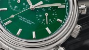 the dial of a green Timex chronograph watch