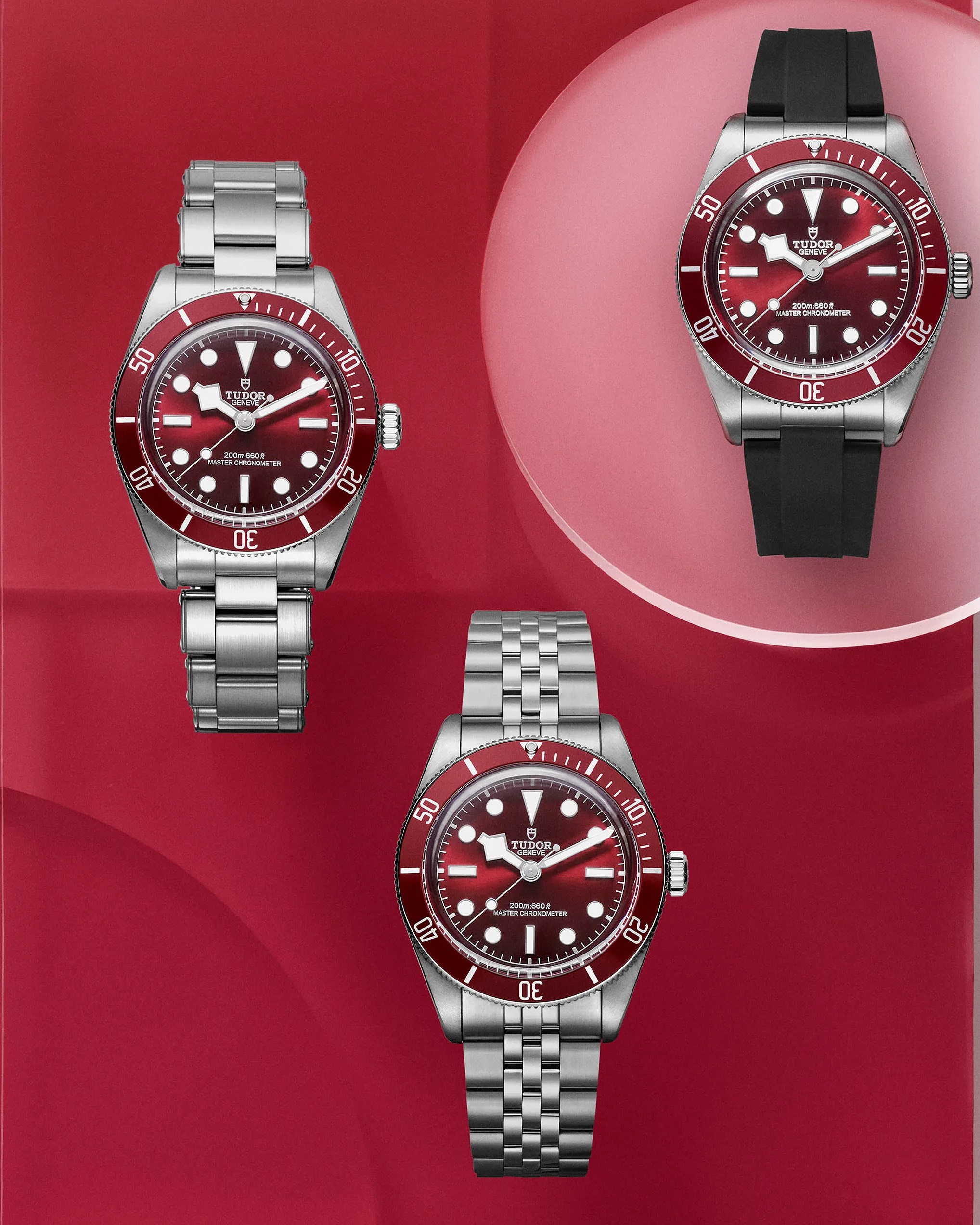 three steel dive watches on a red background