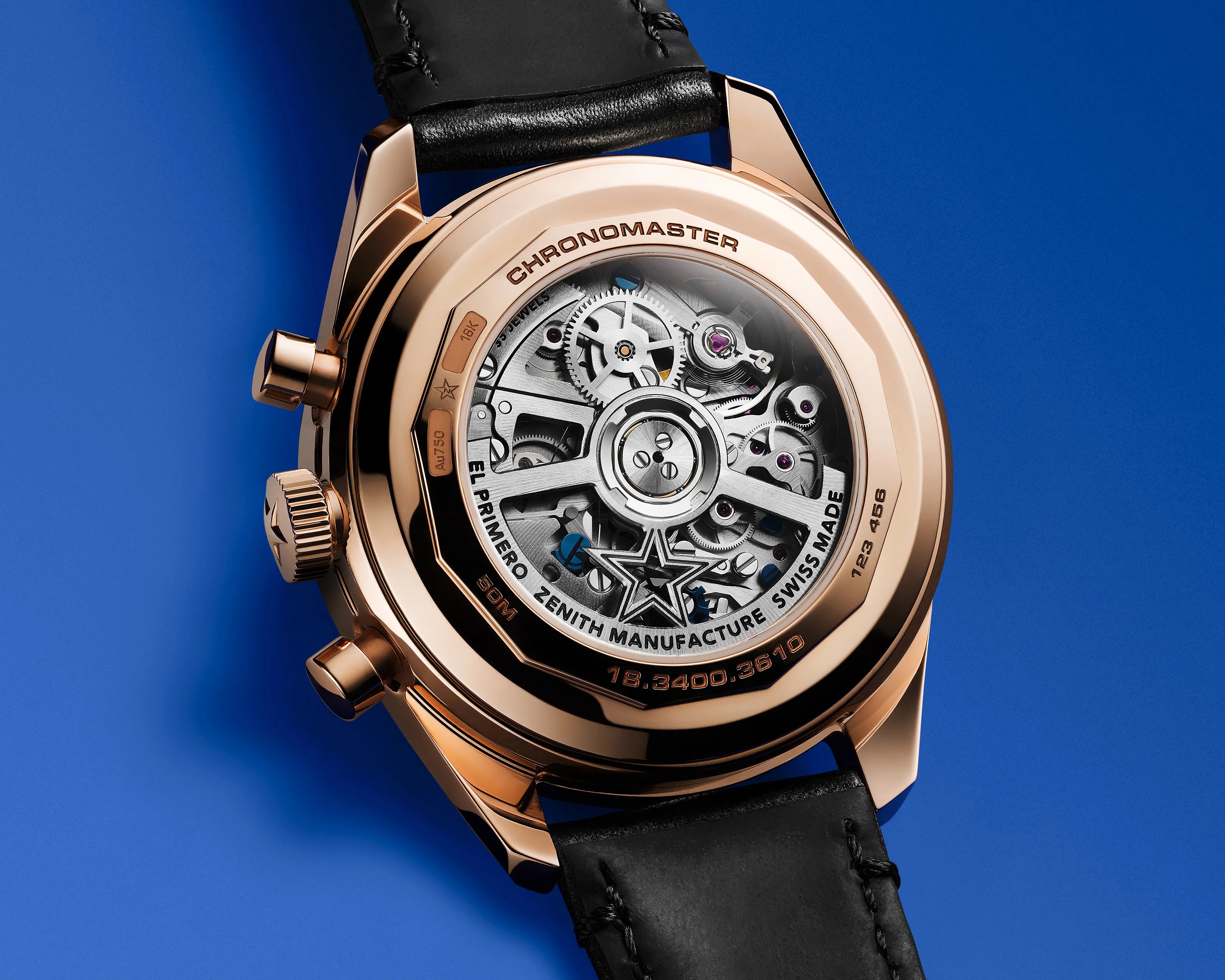 the back of a rose gold Zenith watch