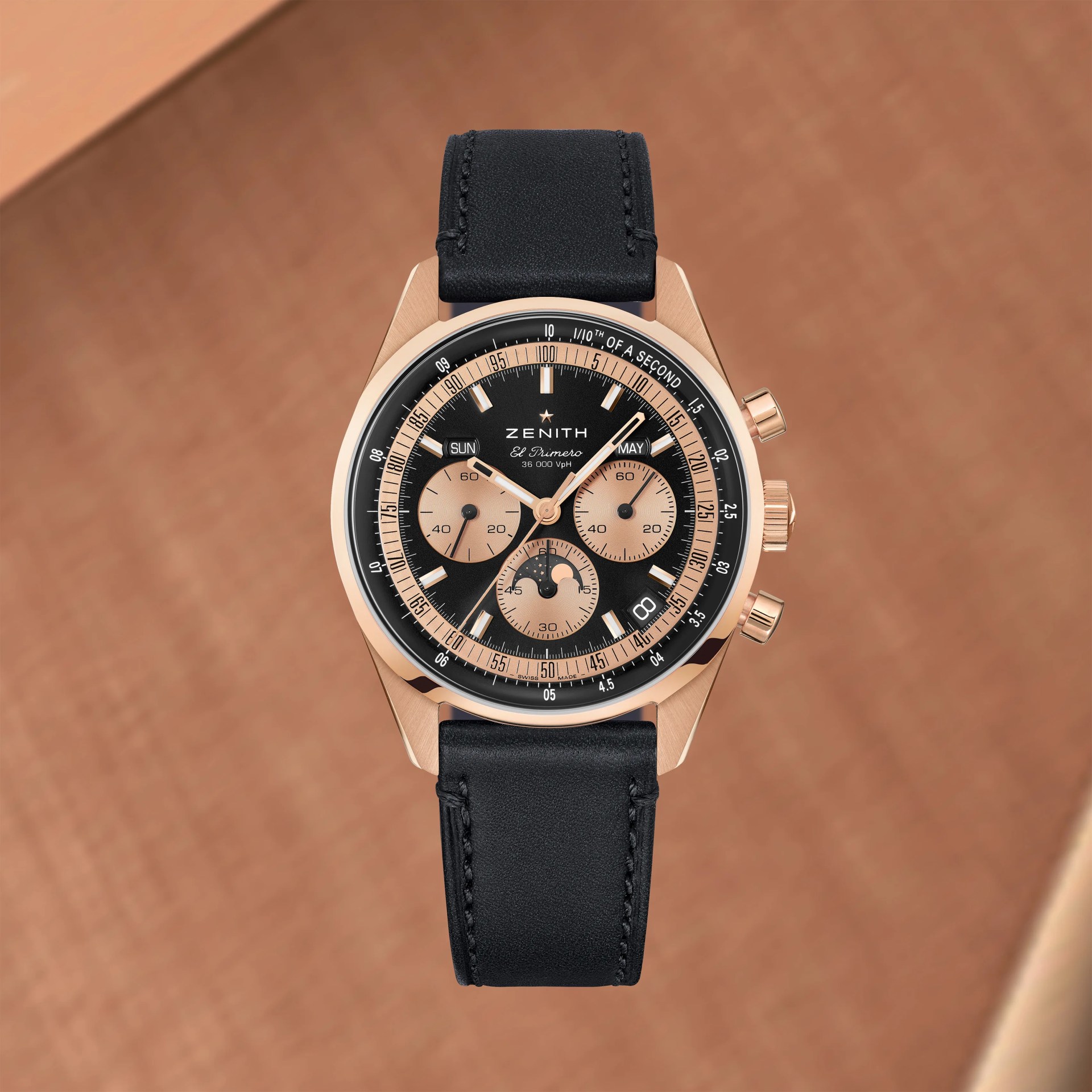 a rose gold chronograph watch