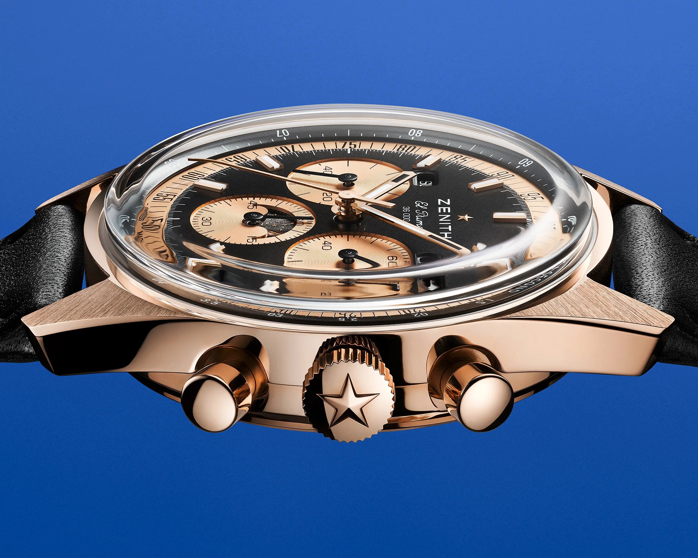 the side of a rose gold chrongraph watch
