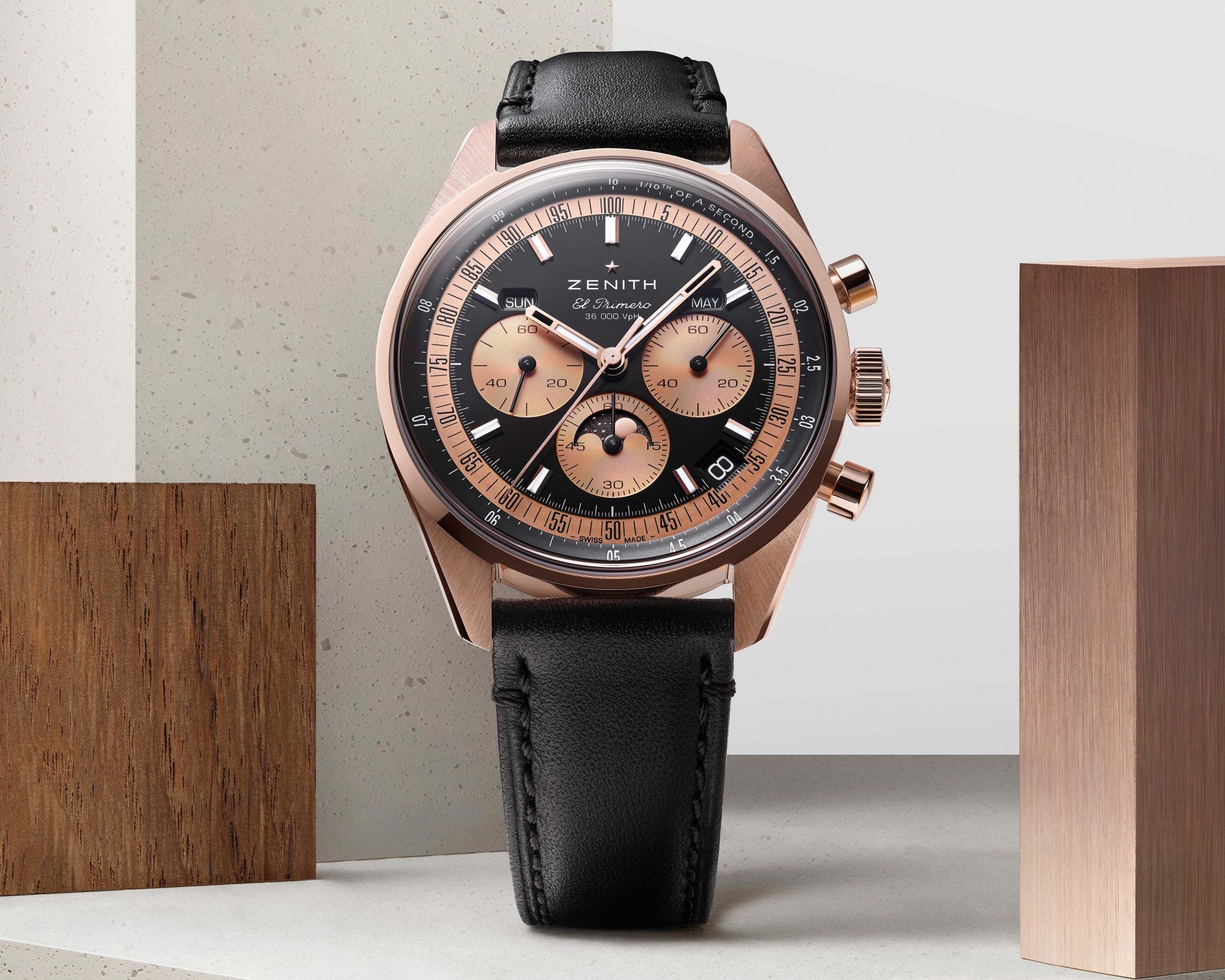 a rose gold chronograph Zenith watch