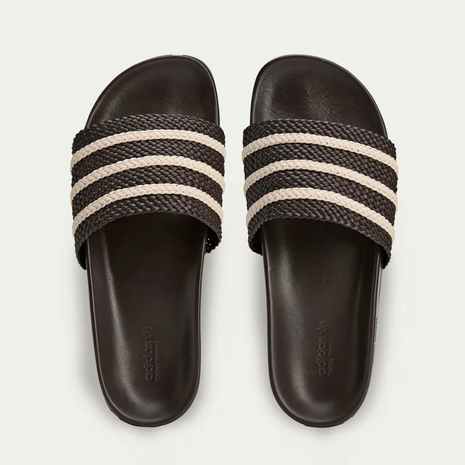 A pair of Wales Bonner Adidas Adilette slides sandals in brown shown from above. 