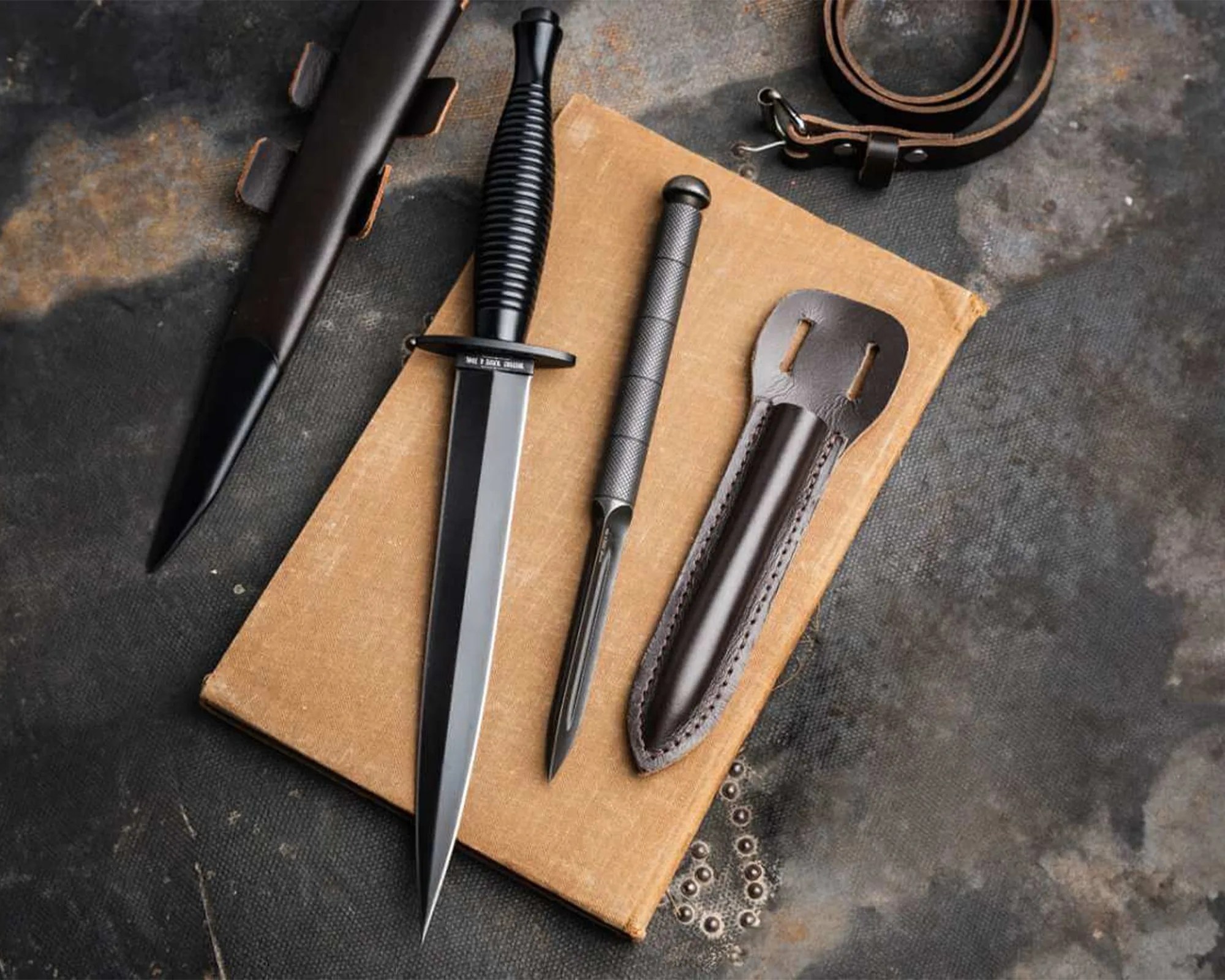 Böker Sleeve Dagger next to full-sized dagger and sheath