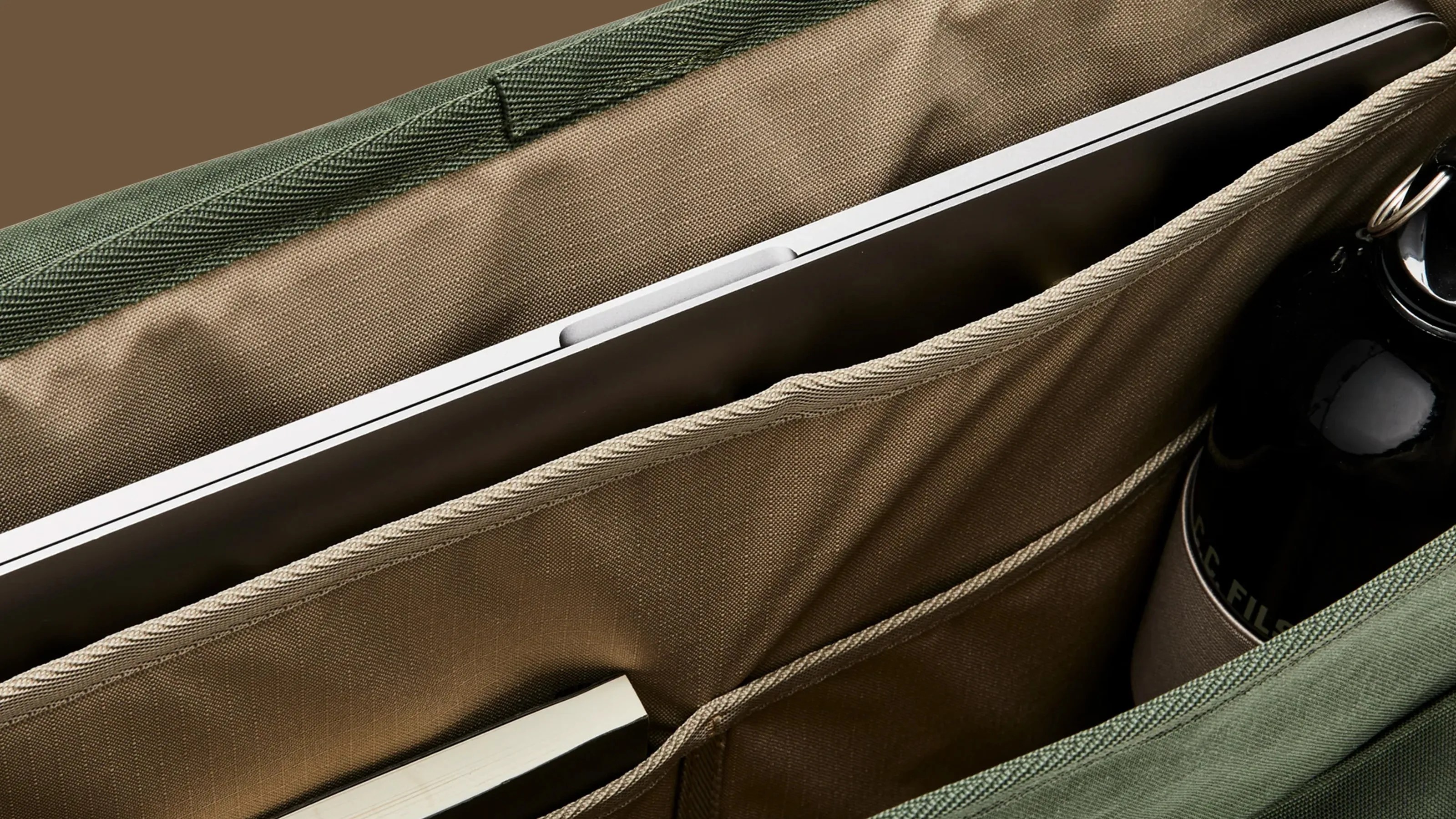 An interior shot of the organization pockets of FIlson's Surveyor Messenger Bag