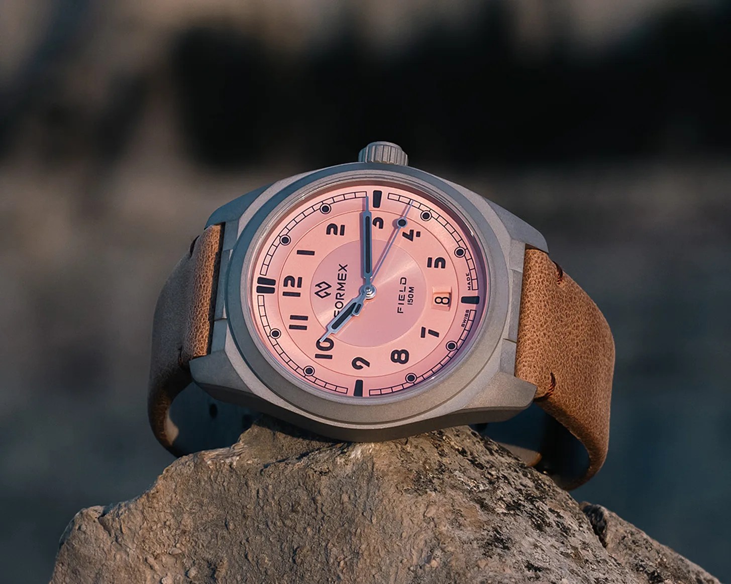 a Formex field watch with a leather strap