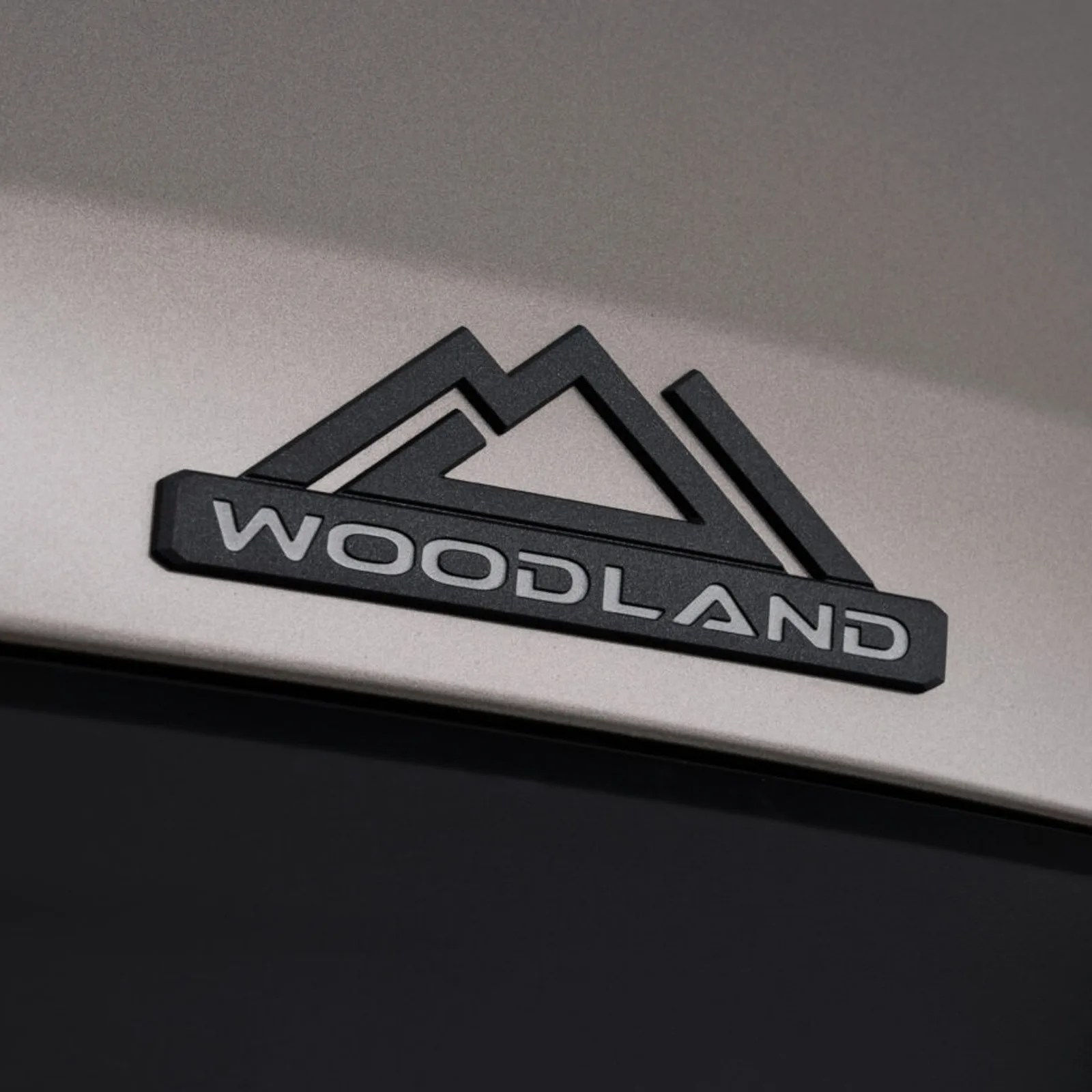 A close-up of the Woodland badging that appears on the Toyota bZ Woodland EV