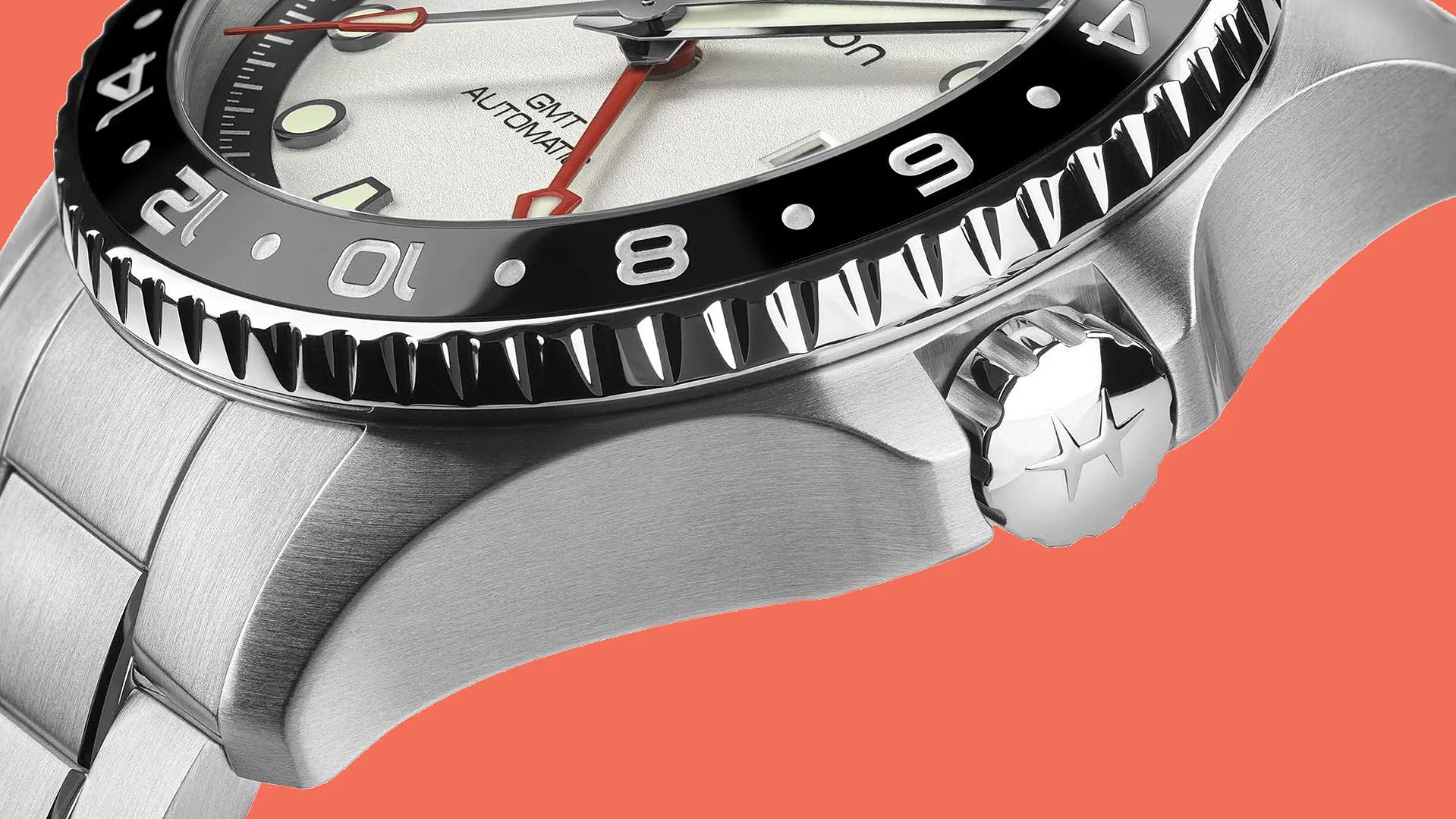 the crown, bezel and dial of a steel Hamilton dive watch