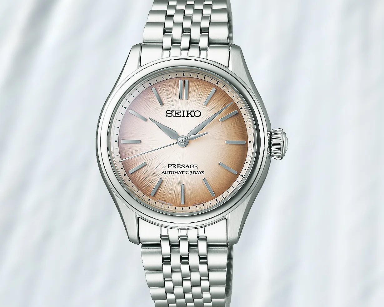 a Seiko dress watch with a cream dial