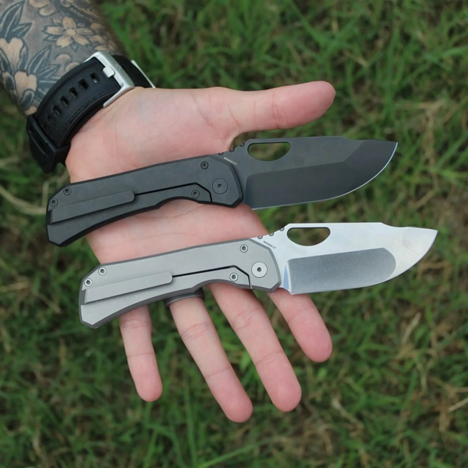 Two Deadman Design Co Elixir EDC Knives in hand