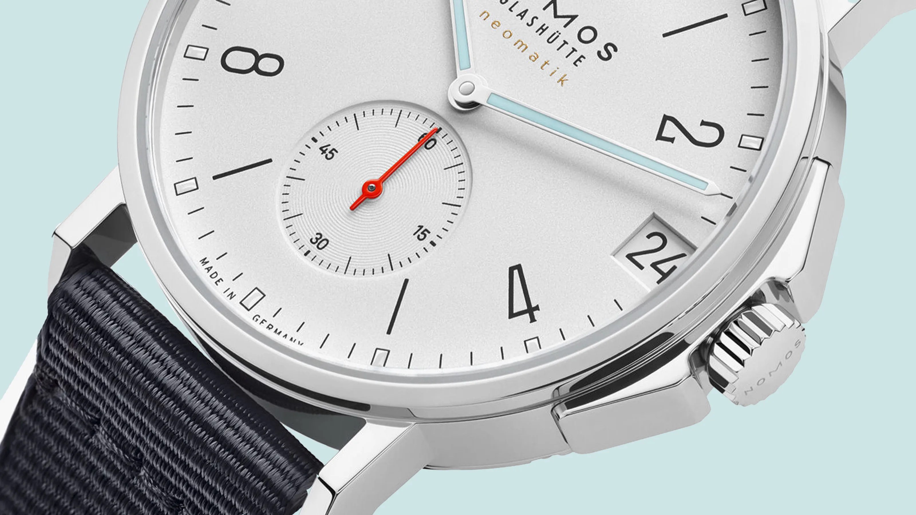 A close up of the lower right hand corner of the dial of the NOmos Glashutte Ahoi Neomatik 38 Date in White