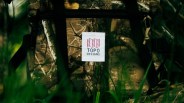 Topo Designs Forest Floor Camo logo closeup