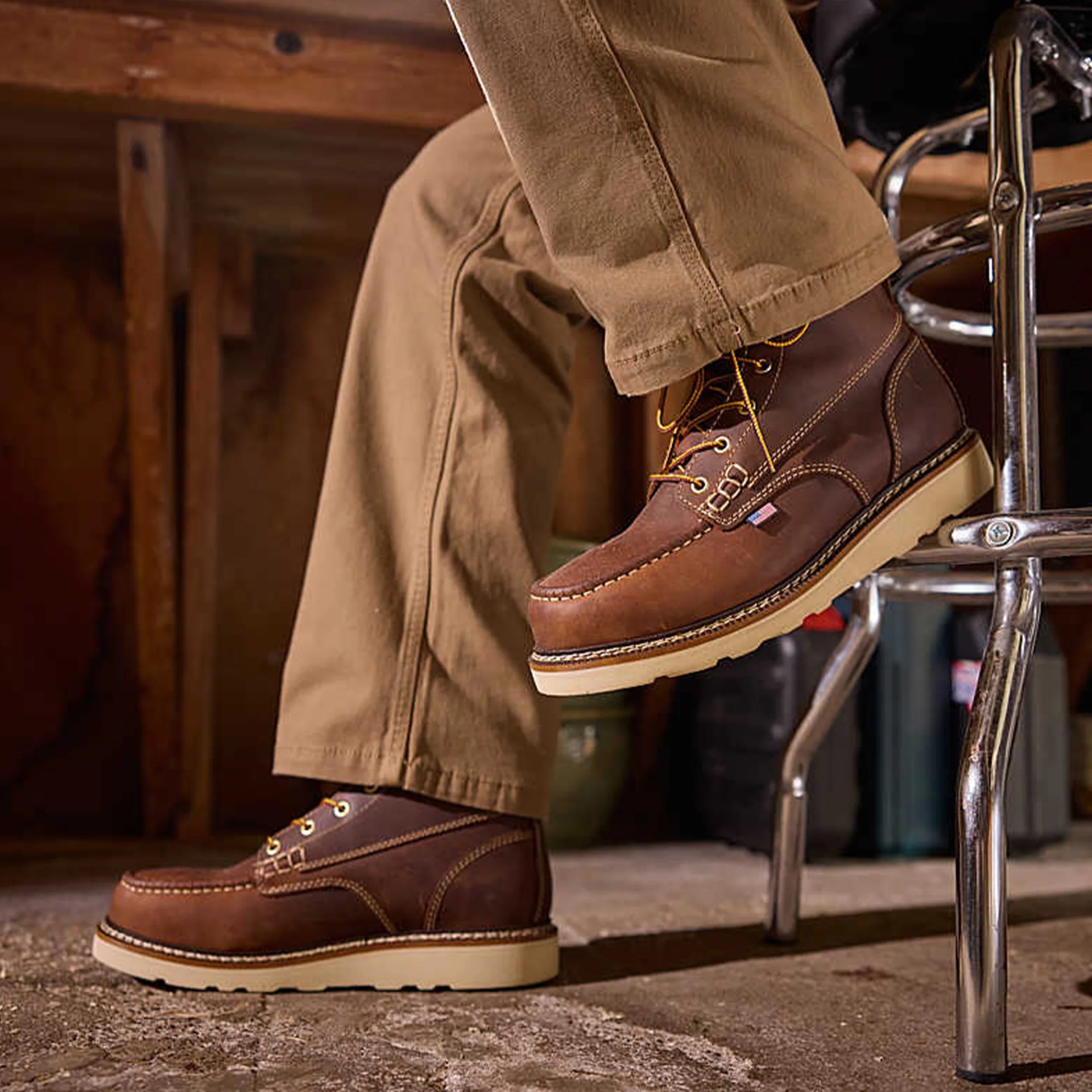 Wolverine Workshop Wedge Work Boot worn by person in tan pants in workshop