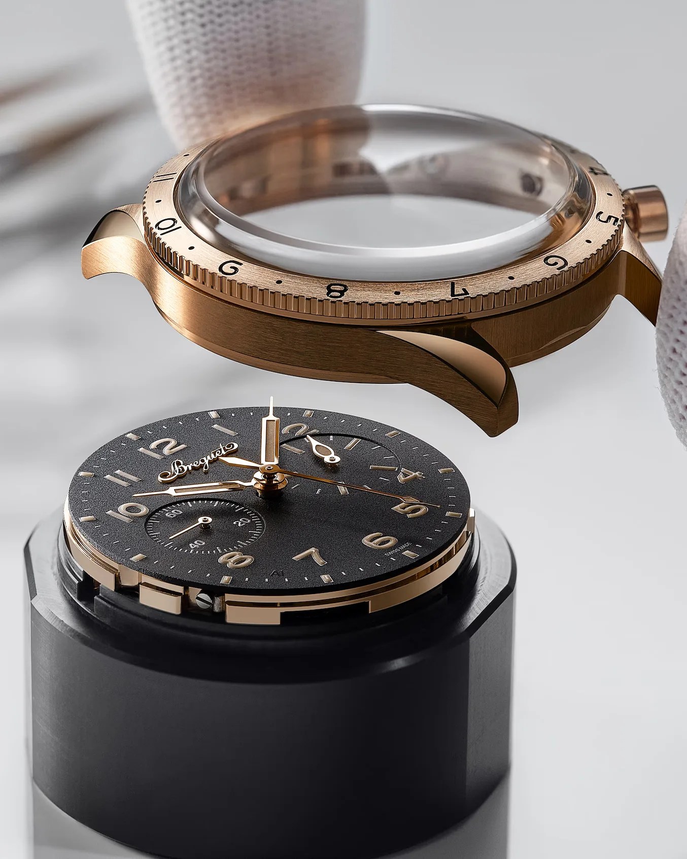 a Breguet watch being assembled