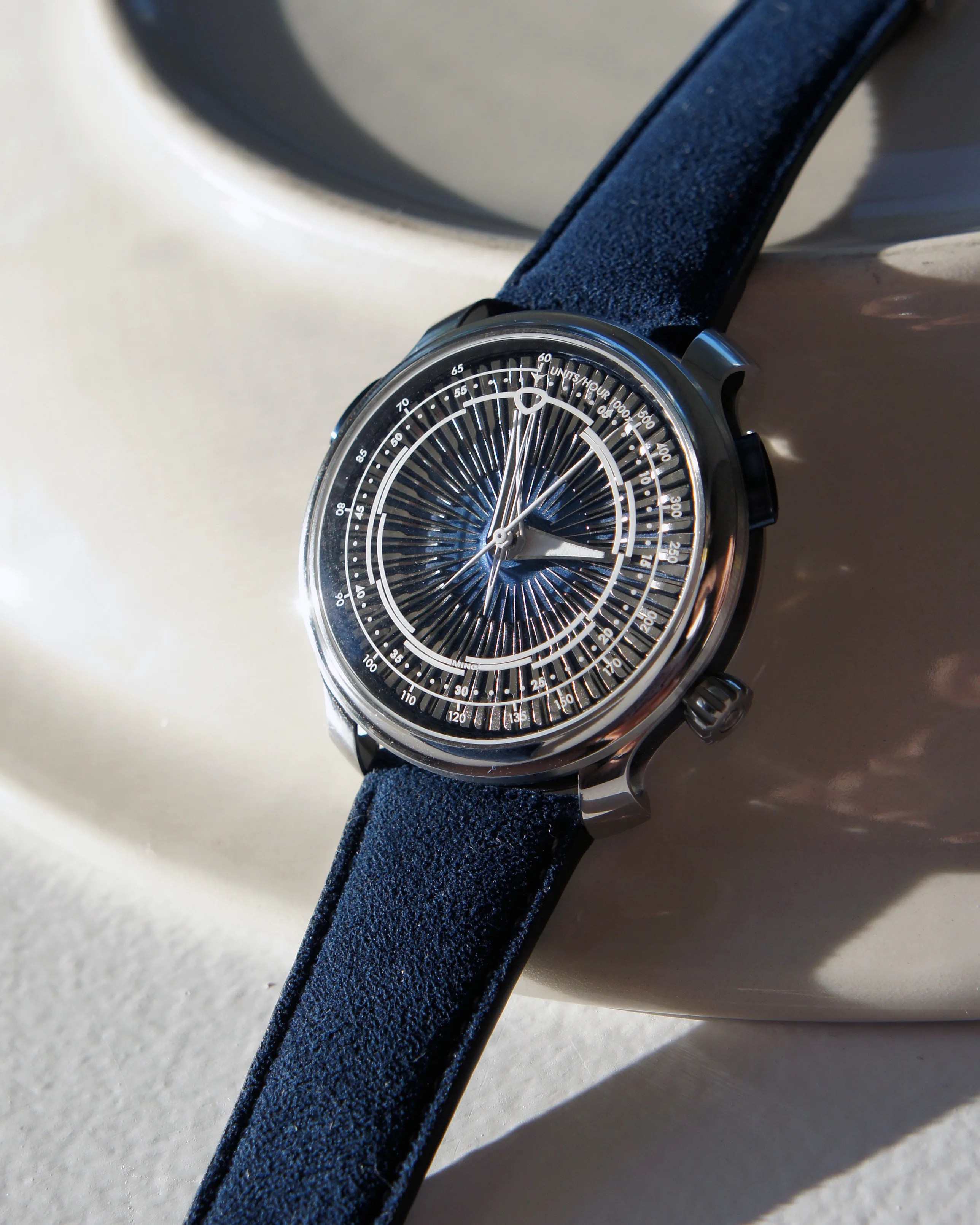 a Ming watch with a blue strap