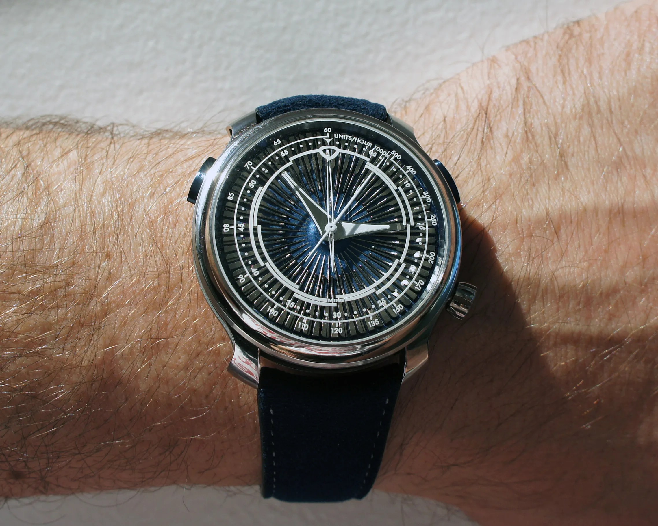 a Ming watch on a man's wrist