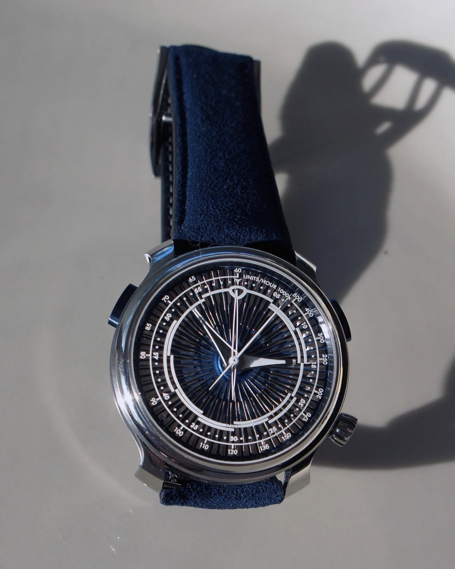 a Ming watch with a blue strap