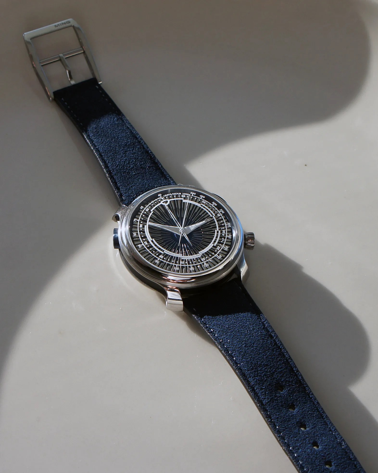 a Ming watch with a blue strap