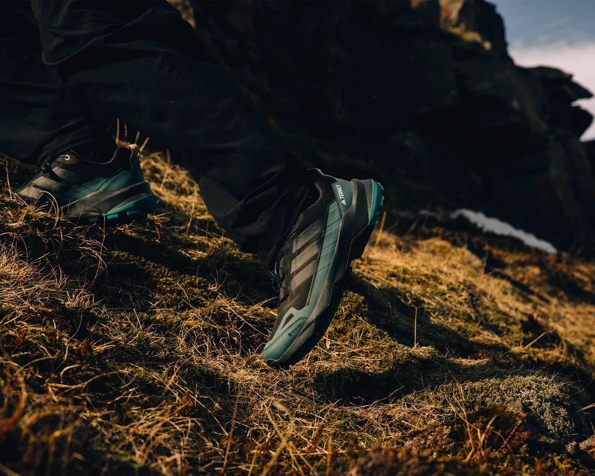 Adidas Skychaser AX5 Gore Tex Hiking Shoe worn by hiker on mossy mountainside