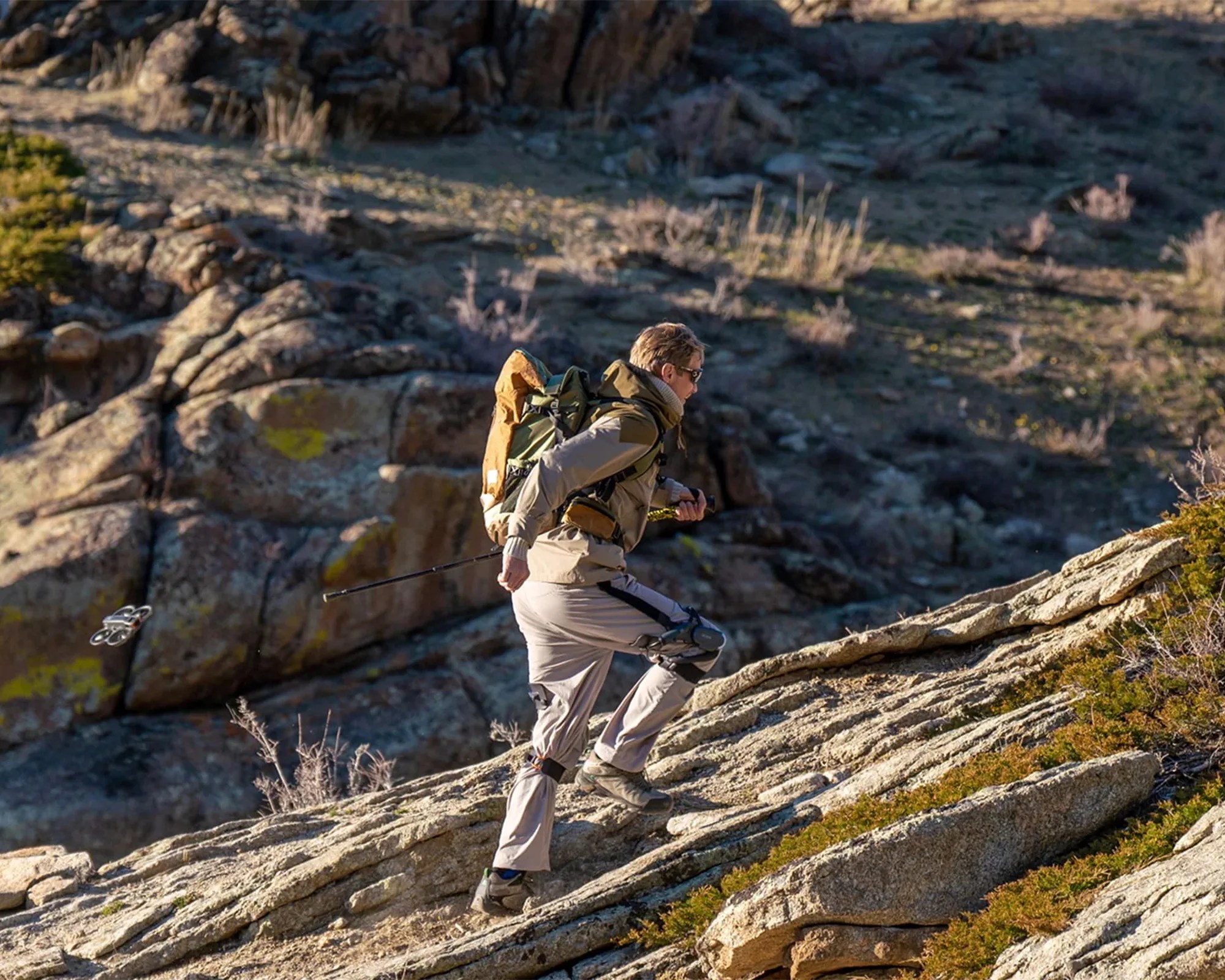 Dnsys Z1 Knee Exoskeleton on hiker running uphill on trails