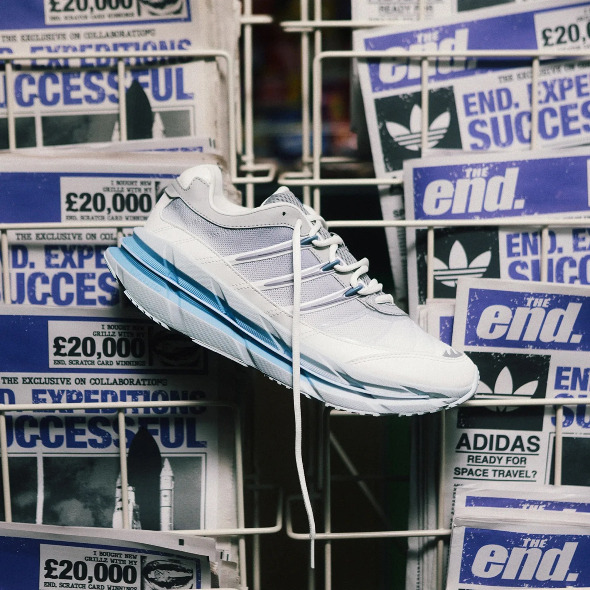End. x Adidas Harmony Sneaker in front of newspaper rack