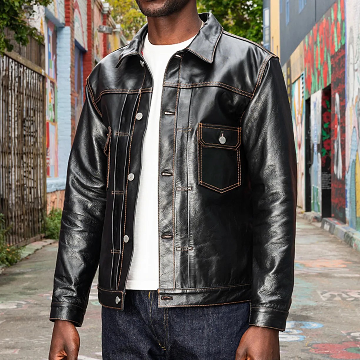 a man in a black leather jacket