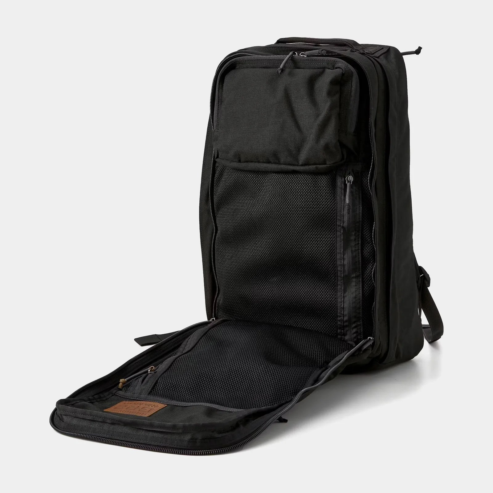 The front flap of the Huckberry X GORUCK GR2 Slick Backpack - 40L shown unzipped and laying flat