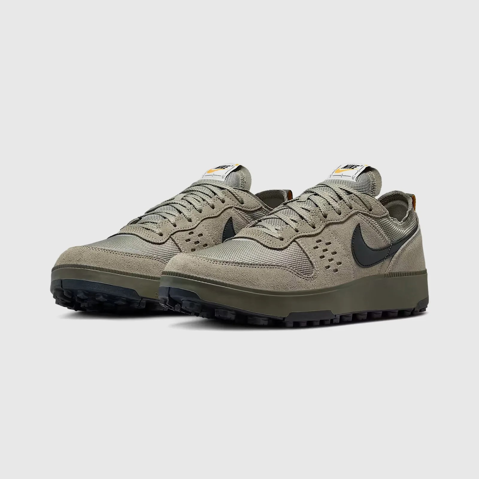A pair of Nike C1ty Surplus Sneakers in Army Green