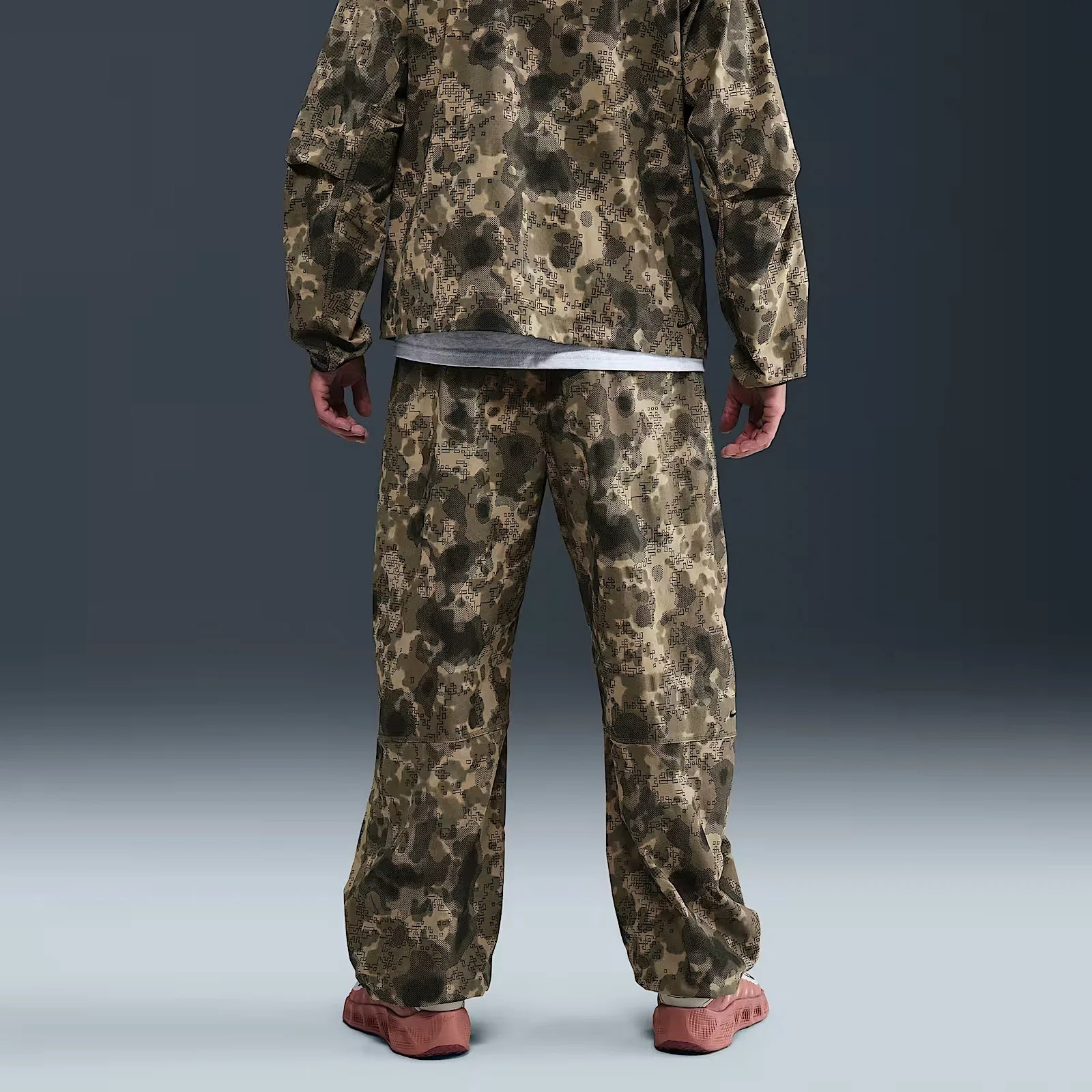 man in camo tracksuit