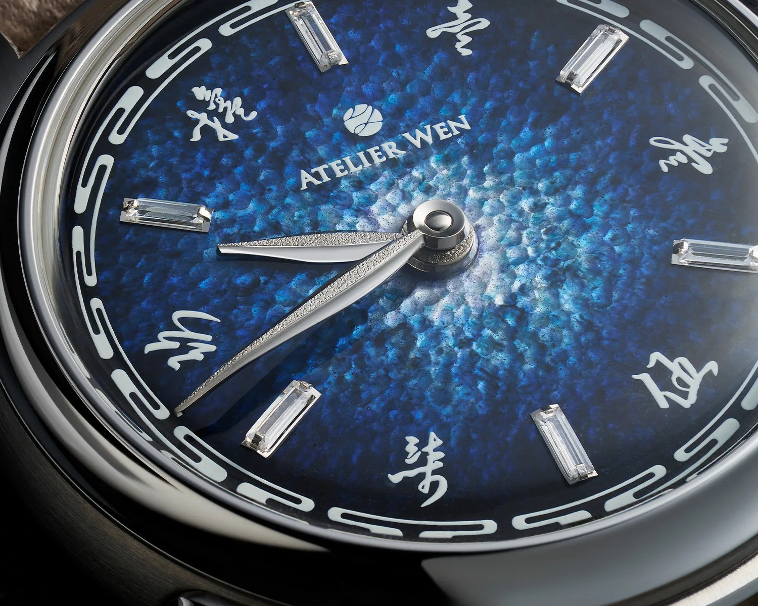 a closeup of an atelier wen watch dial