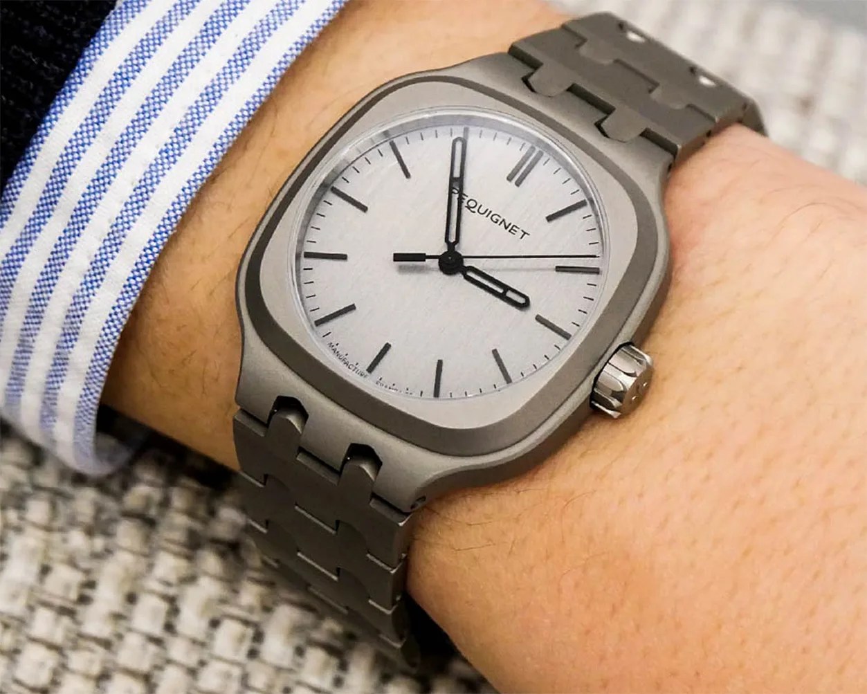 a titanium Pequignet watch on a man's wrist