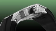 a closeup of the crown and lugs on a richard mille watch