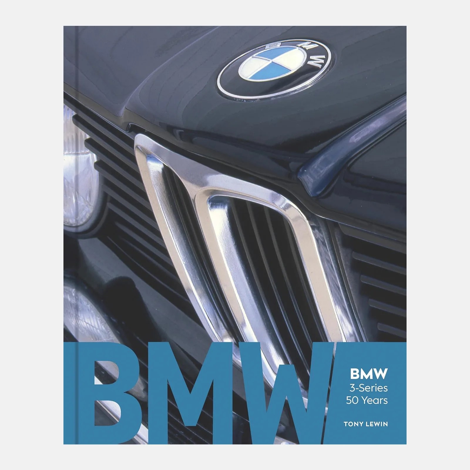 Close-up of the front grille and hood emblem of a classic BMW car, featuring the iconic kidney grille design and the BMW roundel logo. The image is overlaid with large blue text "BMW" and smaller white text reading "BMW 3-Series 50 Years" and "Tony Lewin" in the bottom right corner.