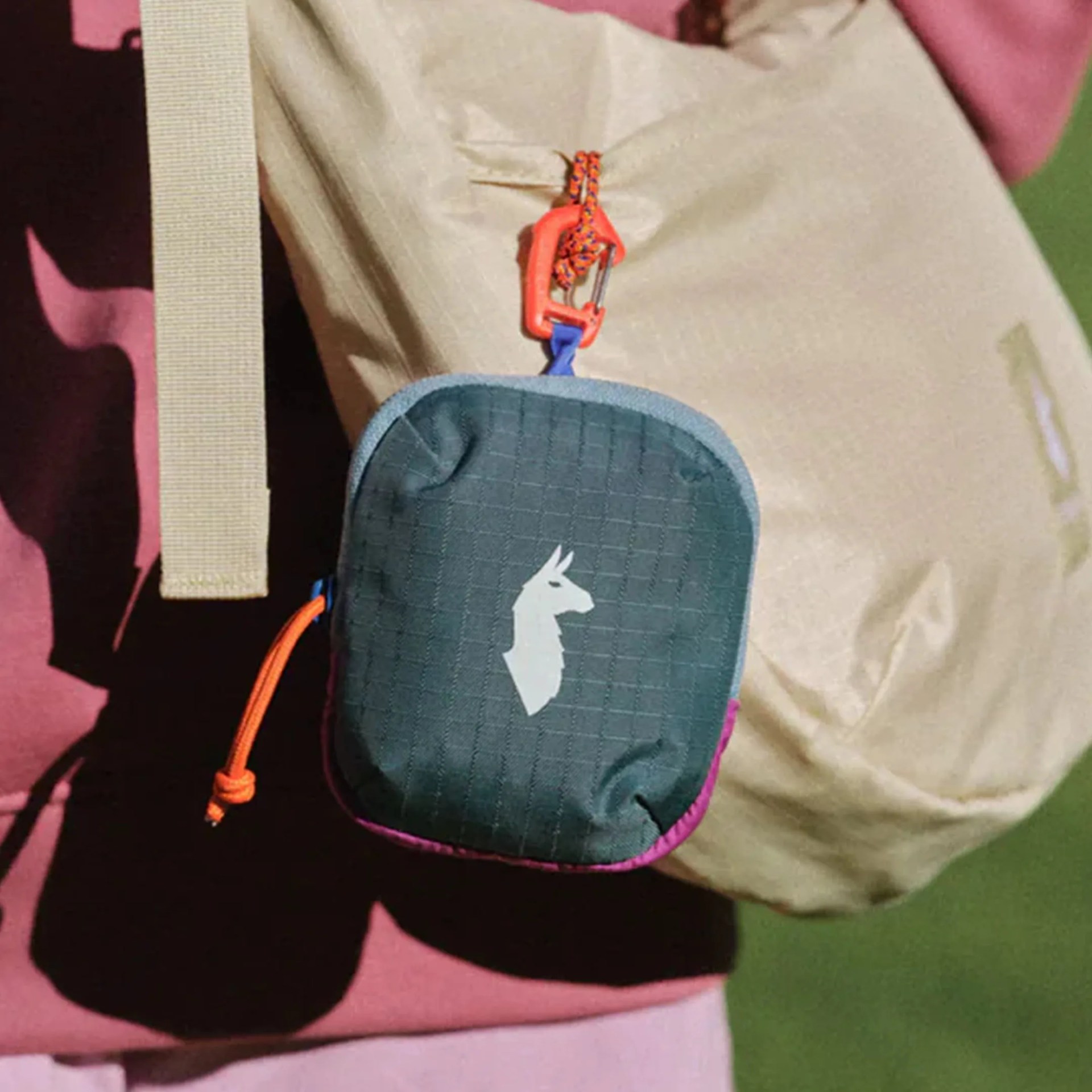 Cotopaxi Allpita Mini Bag attached to other bag